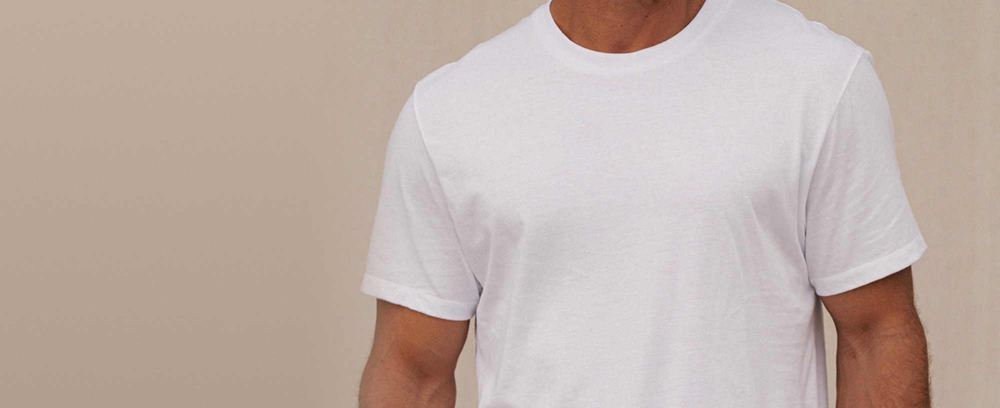 Close-up of the white Apex Tee collar and shoulders